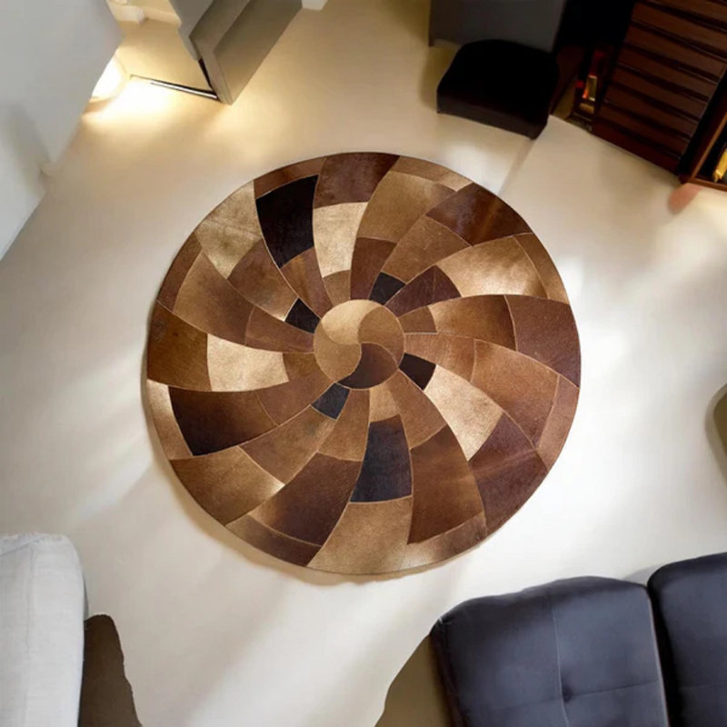 Tapis rond en cuir de vache Whirling
