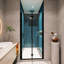 Porte de douche pivotante noire matte - réglable 1 3/8 po, verre trempé 1/4 po, 36 000 ouvertures et fermetures, caractéristique de fuite remarquable