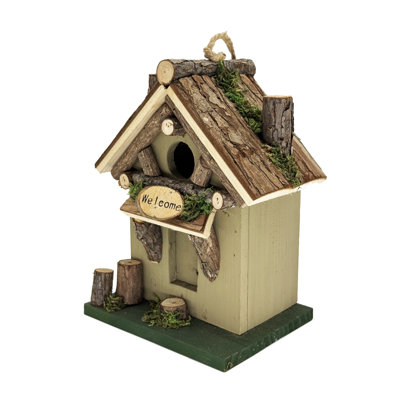 Cabane à oiseaux avec tronc d'arbre