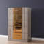 Commode dorée en bois gris
