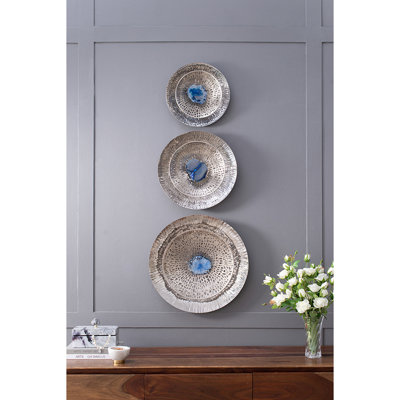 Disque argent texturé surdimensionné