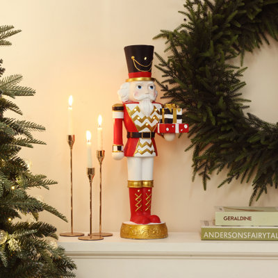 Soldat casse-noisette rouge 2 pieds avec cadeaux, décoration de Noël à piles