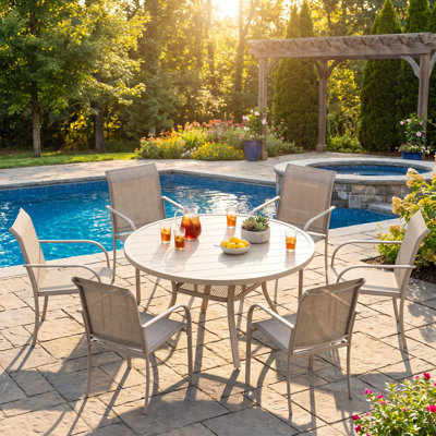 Ensemble repas pour 6 personnes avec table ronde et 6 chaises empilables