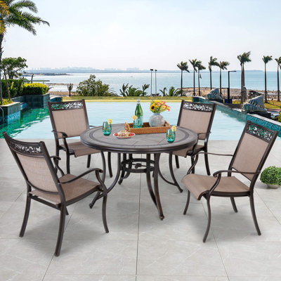 Heinrick 4 - Person Patio Dining Set with Round Table