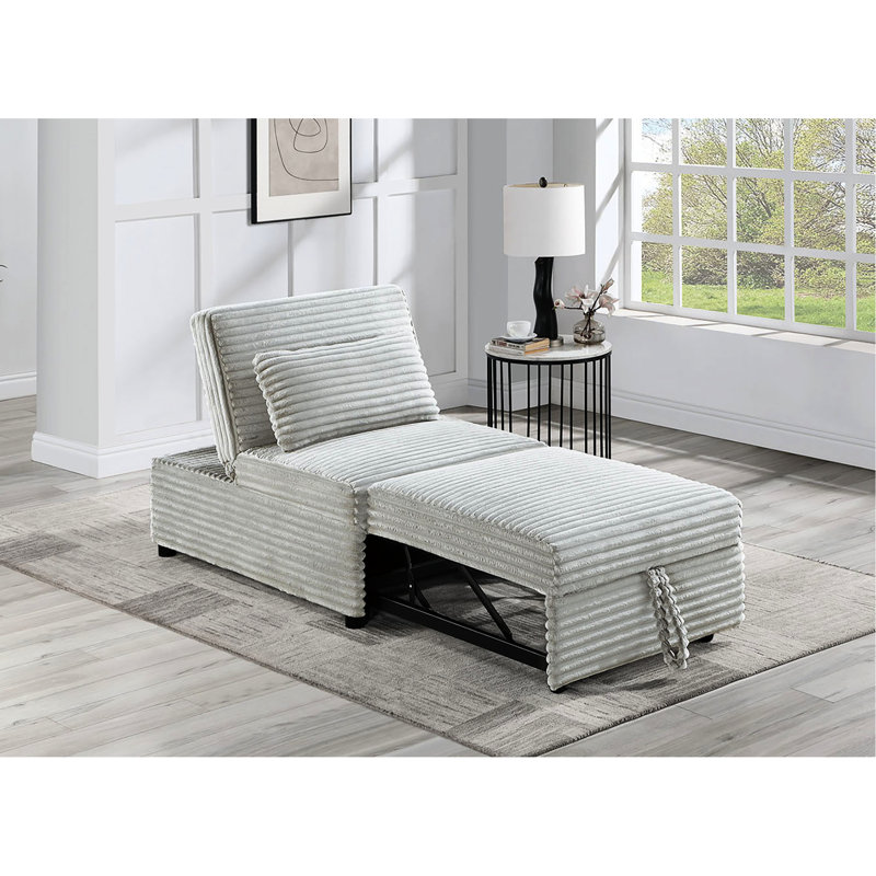 Fauteuil convertible avec lit gigogne en velours côtelé gris, couleur fumée.