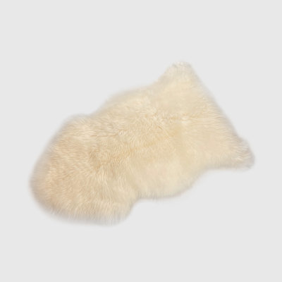 Tapis en peau de mouton Fris couleur champagne