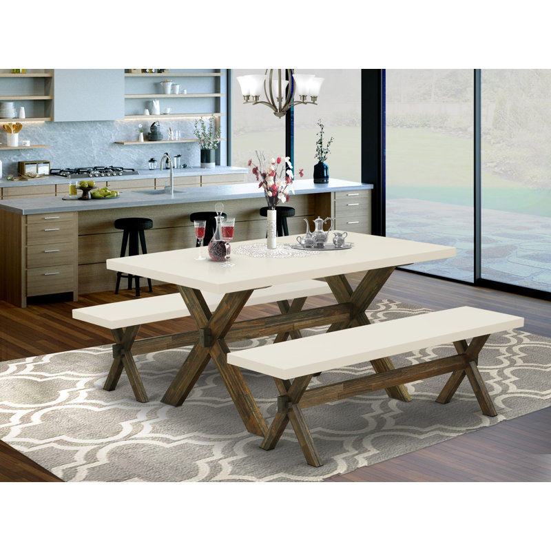 L'ensemble de table de salle à manger 3 pièces contient une table de cuisine rectangulaire avec pieds en X et 2 bancs de salle à manger, finition jacobine patinée