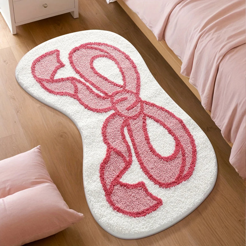 Tapis de bain pelucheux rose