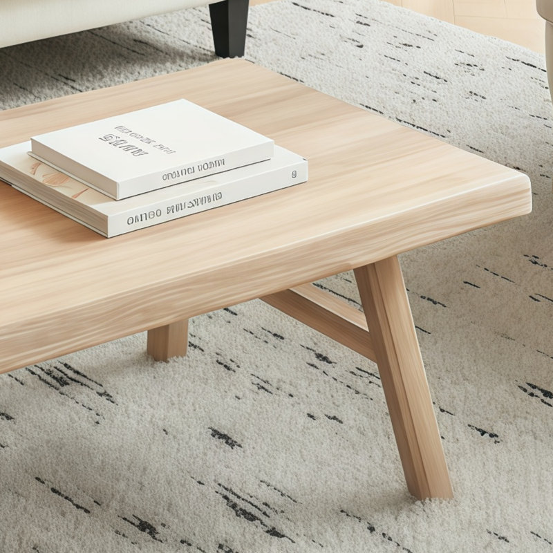 Table basse en bois massif de couleur naturelle de style campagnard, design rectangulaire et rustique, convenant aux salons.