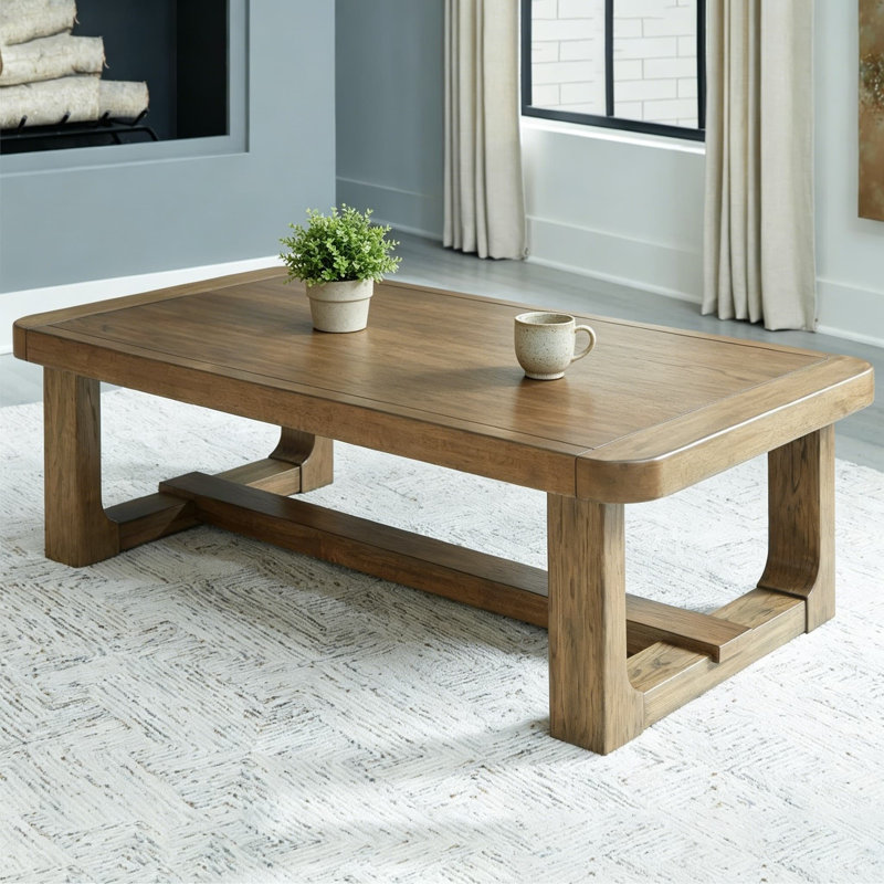 Table basse moderne Cabalynn avec structure en bois massif, finition vernie brun clair, table basse rectangulaire de 56 pouces pour le salon