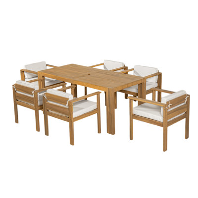 Ensemble repas 7 pièces avec table en bois d'acacia et coussins amovibles