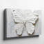 Reproduction d'art monochrome sur toile texturée d'un papillon sculpté à partir de couches épaisses de peinture blanche sur toile-570601984