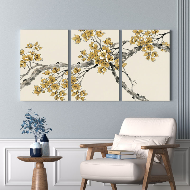 Ensemble de 3 tableaux muraux sur toile de style oriental représentant des branches de cerisier en fleurs dorées.