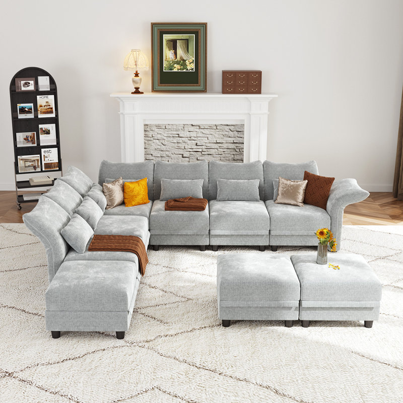 Canapé modulaire symétrique en microfibre avec repose-pieds Caralina, Microfibre / microsuède gris clair