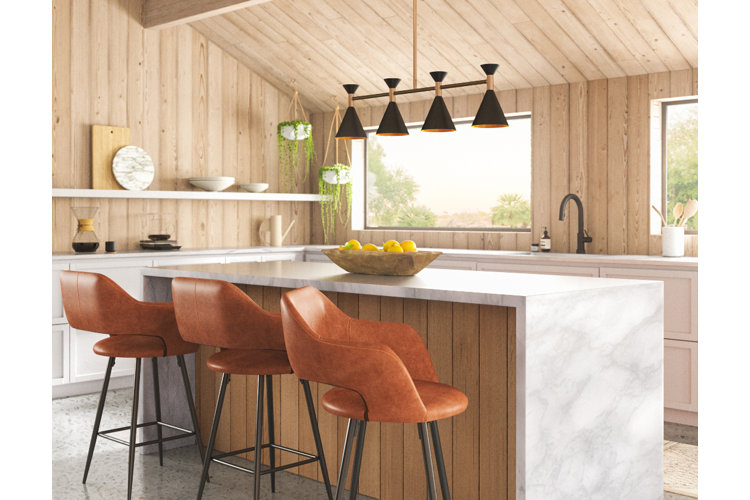 Kitchen with orange barstools.