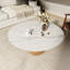 Table basse ronde moderne Gorman pour le salon et la maison-112298378-134767884