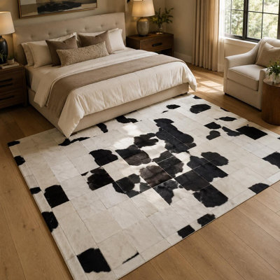 Tapis en cuir de vache noir et blanc fabriqué à la main, tapis en cuir géométrique