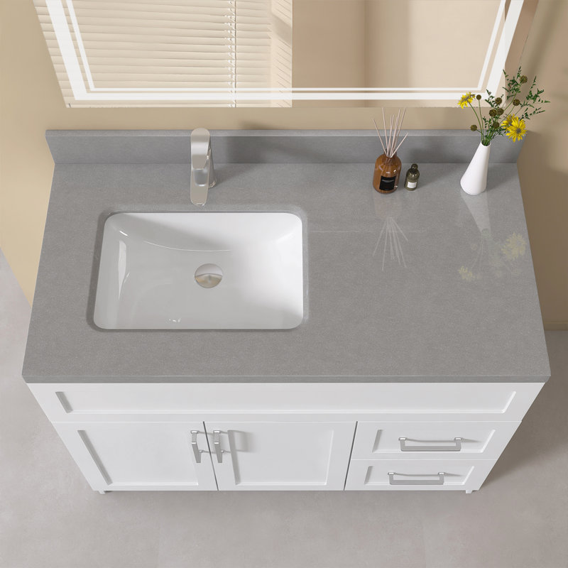Évier de meuble-lavabo supérieur décalé gauche en pierre reconstituée de 42 po x P 22 po avec dosseret de 4 po en marbre gris moucheté