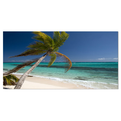 Reproduction de photo sur toile tendue, "palm courbée à des mer"