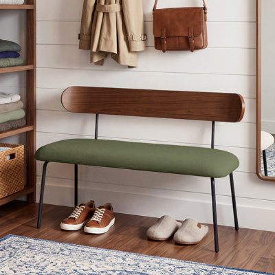 Banc rembourré moderne avec dossier en bois cintré et pieds en métal