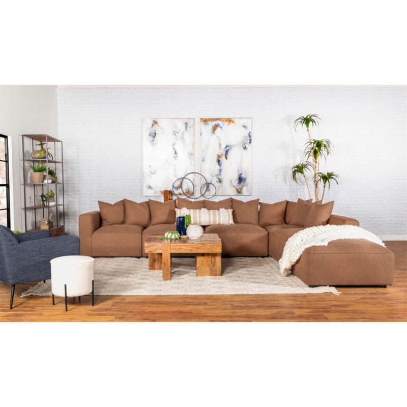 Repose-pieds carré en terre cuite Jennifer avec rembourrage moelleux et savoir-faire raffiné, parfait pour un décor moderne et rustique.