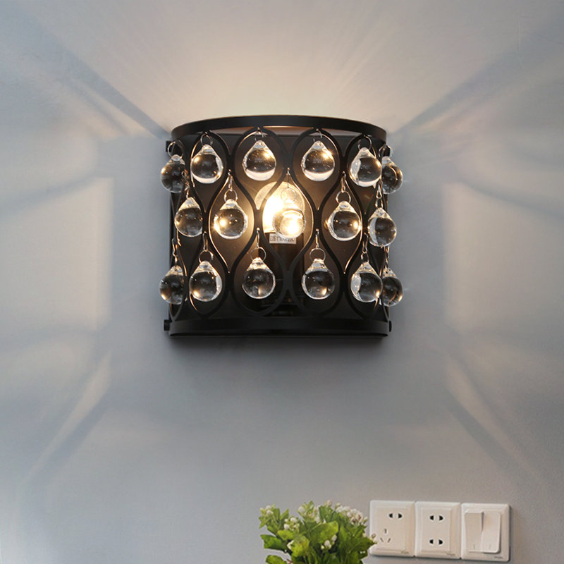Applique murale contemporaine noire matte avec gouttelettes en verre et découpes d'ellipse pour les allées et les entrées
