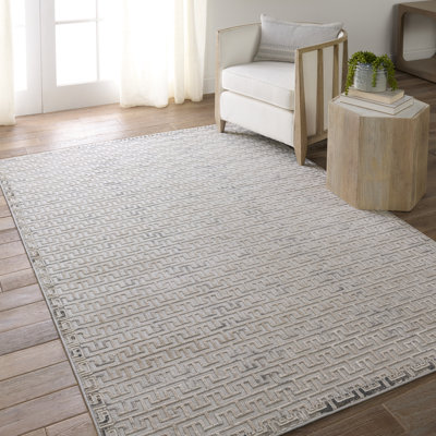 Tapis géométrique gris / beige en polypropylène / polyester tissé à la machine