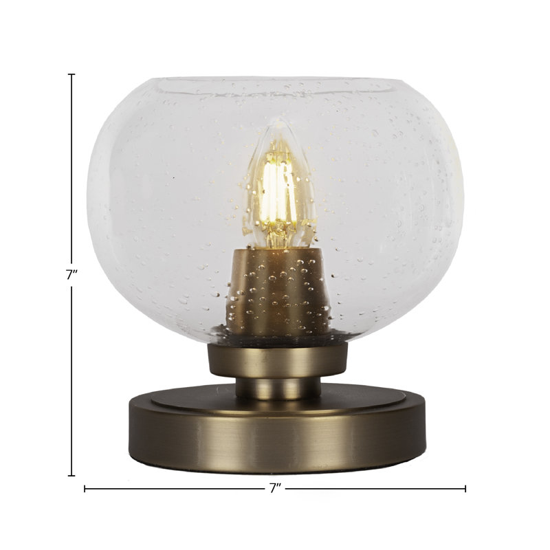 Lampe d'appoint Whitmire présentée en finition laiton New Age avec verre à bulles transparent de 7 po