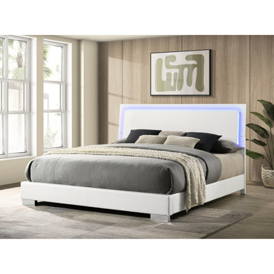 Très grand lit à panneau avec lumières à DEL intégrées, panneau blanc ultrabrillant, idéal pour les espaces minimalistes, tête de lit structurée et finition à l'est de style contemporain à lattes.
