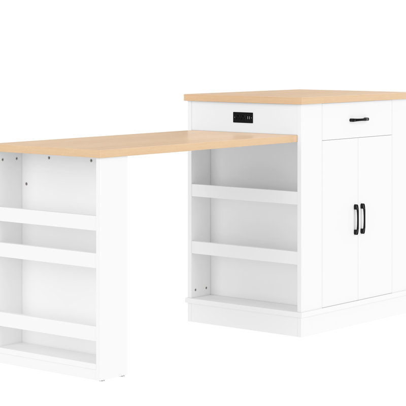 Îlot de cuisine blanc avec comptoir réglable, tiroirs, armoires à double porte et étagères pour cuisiner à plusieurs.