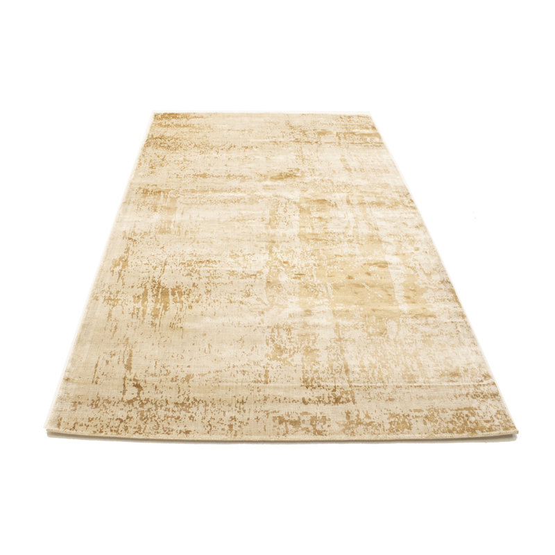 Tapis rectangulaire beige en laine touffeté à la main