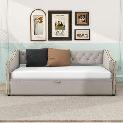 Cristaly Wood Upholstered daybed with Pop Up Twin Trundle