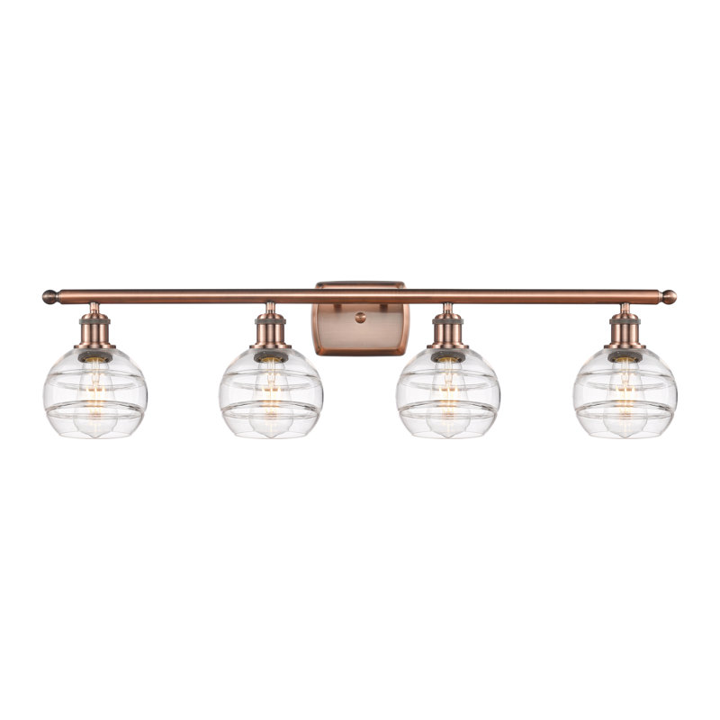 Éclairage pour meuble-lavabo à 4 lumières à intensité variable Chartoff, Transparent, Cuivre antique
