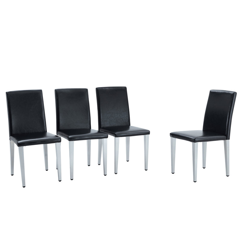 Ensemble de 4 chaises à dossier en polyuréthane avec pieds en métal - un match parfait pour les styles de maison minimalistes et modernes.
