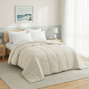 Couverture légère rembourrée de duvet pouvant servir de coussin de couette pour l'été