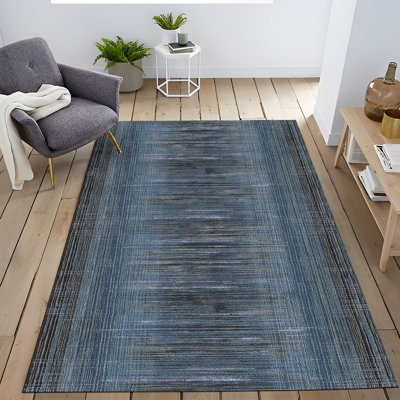 Tapis décoratif à motif de lignes bleues et noires