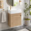 Meuble-lavabo suspendu compact avec lavabo en résine, ouverture par simple pression sans poignée et charnières à fermeture en douceur pour espaces modernes-441806572
