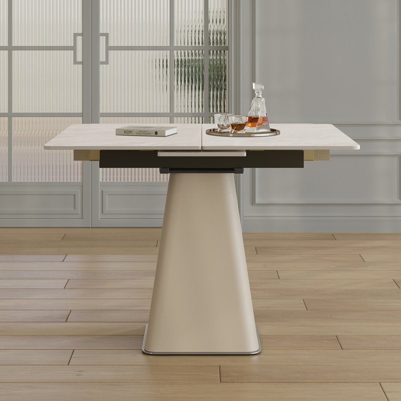 Table de salle à manger rétractable moderne pliable avec dalle de roche et base en acier inoxydable recouverte de cuir - Gain de place pour les petits appartements