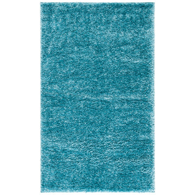 Tapis turquoise à longs poils