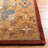 Ezell Hand Tufted Wool/Cotton/Latex Floral Rug in Rust-16768922