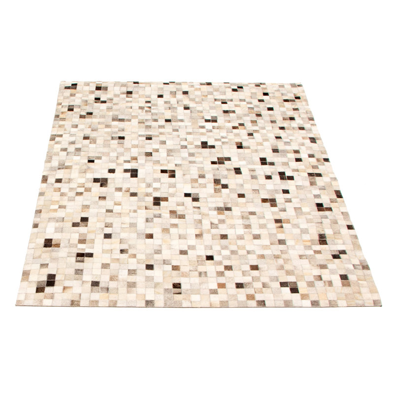 Tapis gris / brun / beige en cuir de vache fabriqué à la main Arvena