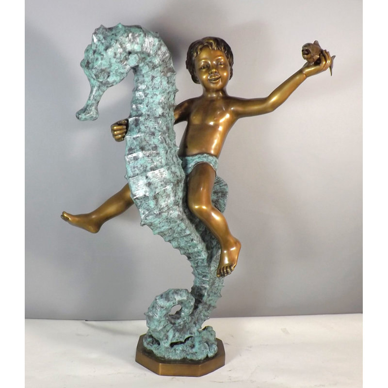 Garçon sur un hippocampe