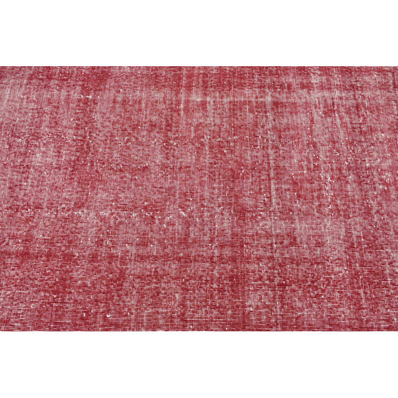 Un tapis turc rétro fabriqué à la main en rouge offre un style anatolien authentique pour une décoration de sol unique