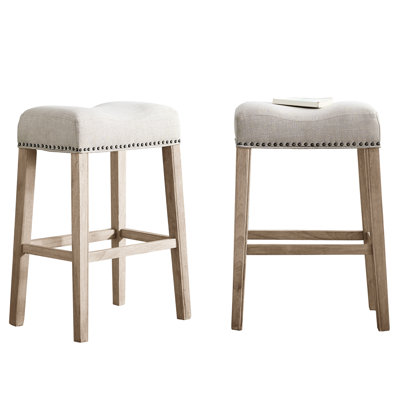 Tan 29" Backless Bar Stools With Saddle Seat, Of 2. Genuine Wood, Weathered Grain. Upholstered. Contemporary Design. 18"w X 13"d 29"h. Assembly Required. Home Use Upholstered Seat 2 - Real Wood