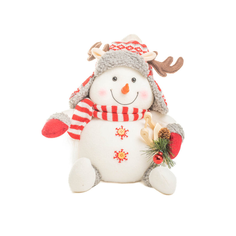 Bonhomme de neige blanc assis