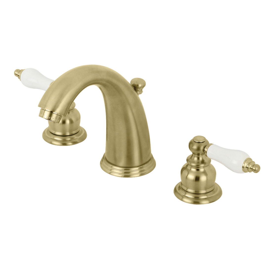 Kingston Brass Victorian Two-Handle 3-Hole Deck Mount Widespread Bathroom Faucet with Retail Pop-Up Drain Kingston Brass 