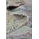 Tapis en laine Karina gris / bleu / rouille / jaune