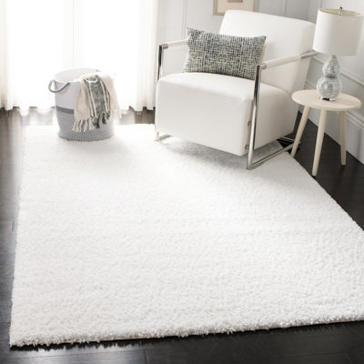 Montelongo Looped/Hooked White Rug