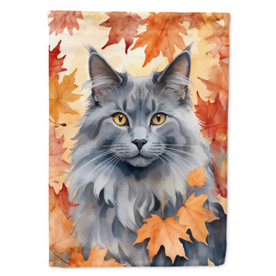 Chat en feuilles d'automne