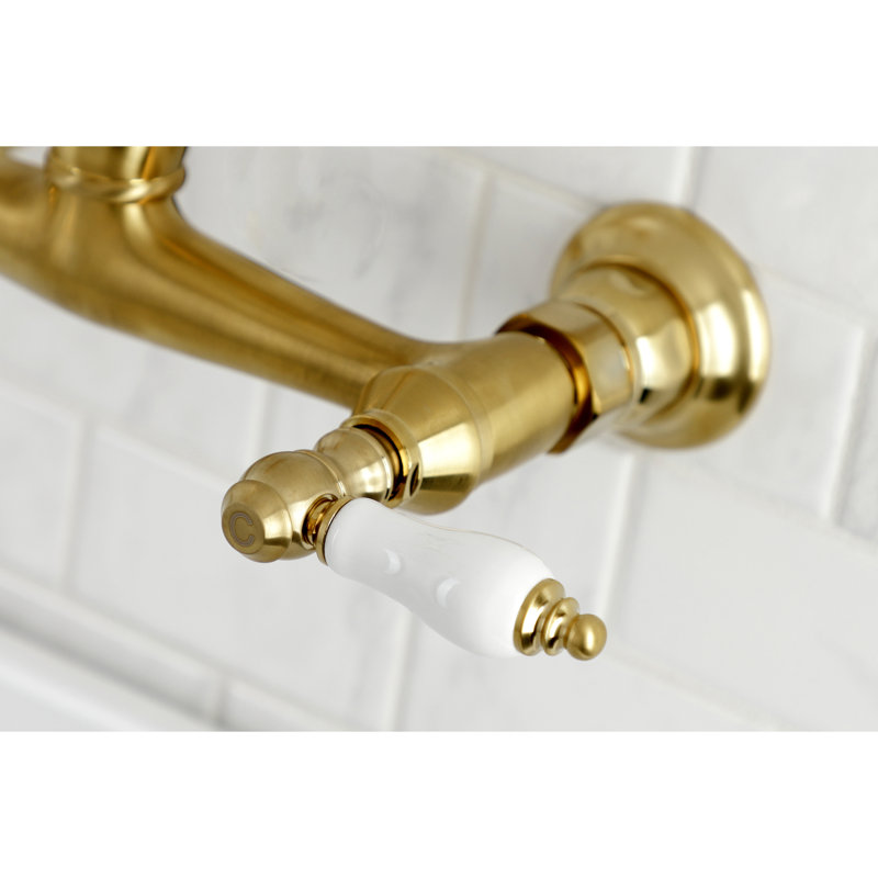 Kingston Brass Vintage Two-Handle 2-Hole Wall Mount Bathroom Faucet, Lever Handle, Brushed Brass